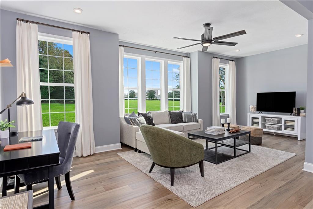 111 Affinity Drive Harmony, PA 16037 - Photo 3 of 16 a living room with furniture flat screen tv and a large window
