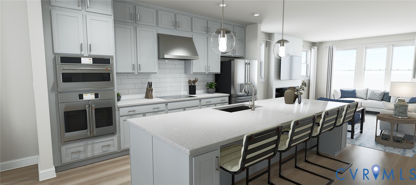 16041 Aspect Way Midlothian, VA 23113 - Photo 13 of 39 a kitchen with stainless steel appliances a sink a stove a refrigerator cabinets and dining table