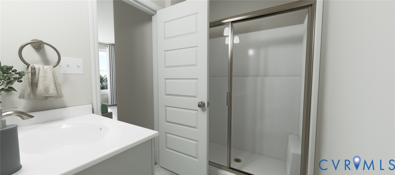 16041 Aspect Way Midlothian, VA 23113 - Photo 6 of 39 a bathroom with a sink a mirror and a shower