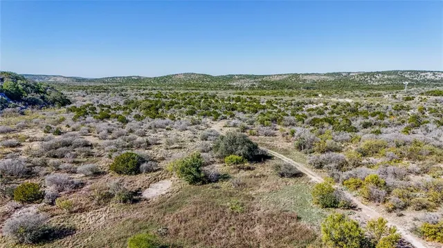 a living room with furniture fireplace and flat screen tv