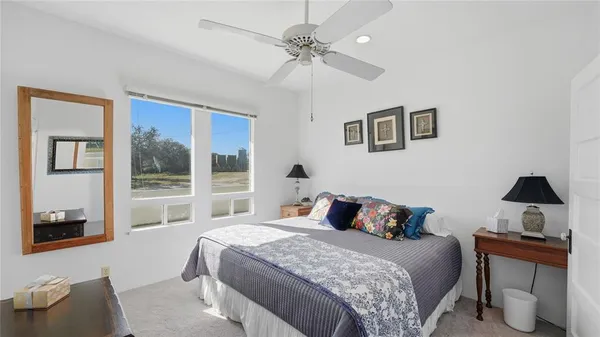 a bed room with a bed and a dresser