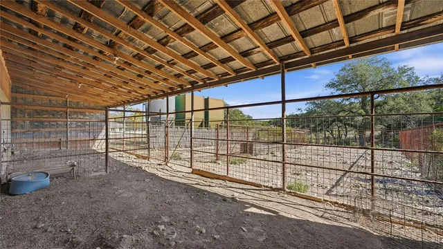 a view of a chairs and tables in a room