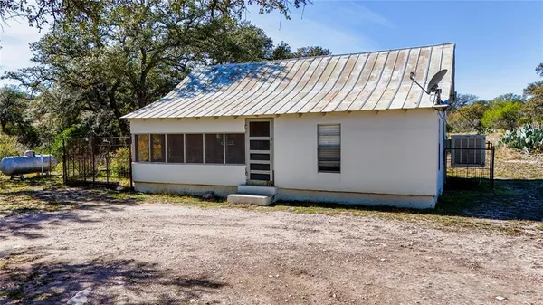 a view of a yard with a mountain