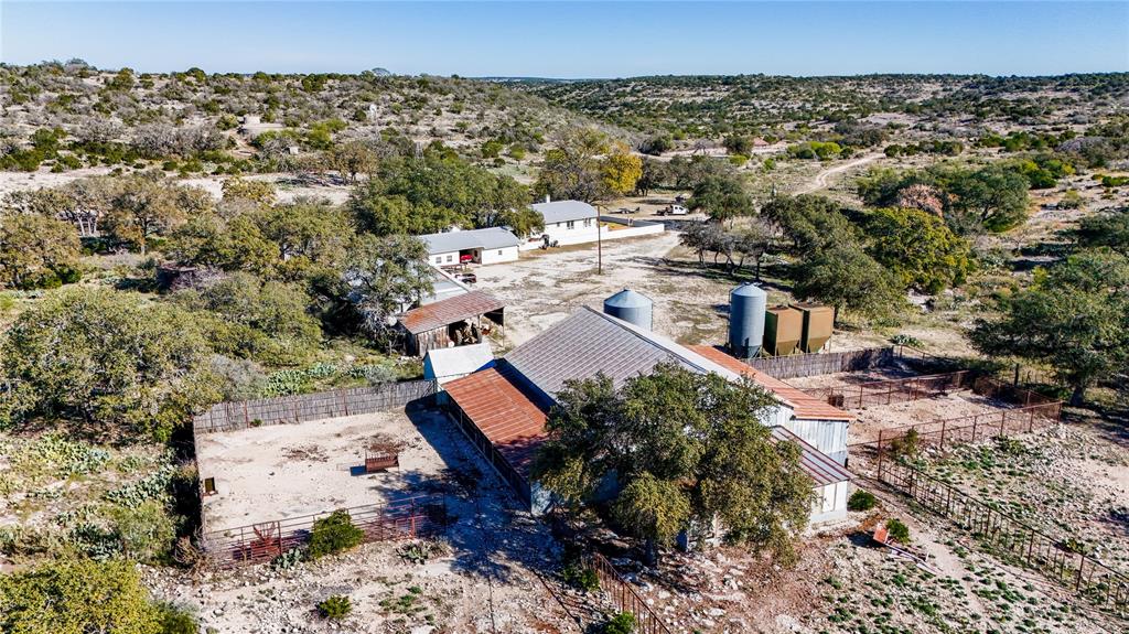 Undisclosed Address Del Rio, TX 78840 - Photo 5 of 40 an aerial view of a house with a yard