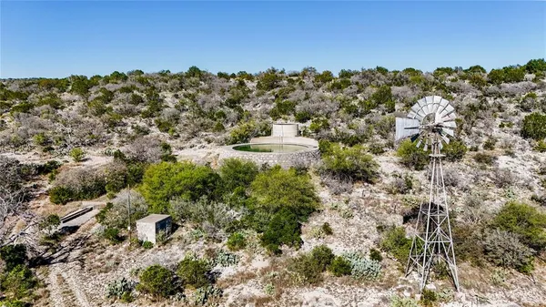 a table and a house with a outdoor space