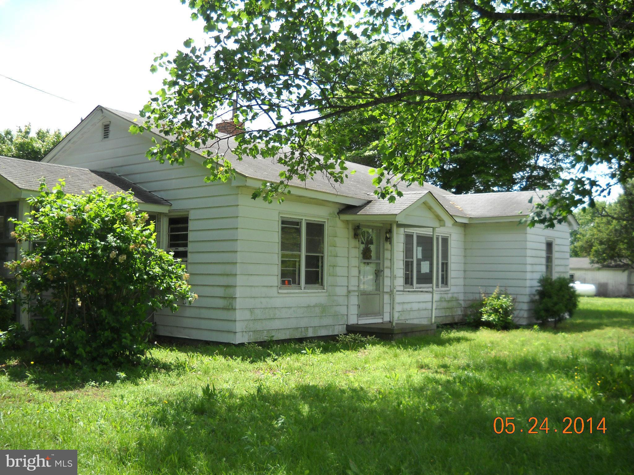 22121 Dover Bridge Road Preston, MD 21655 - Photo 1 of 1 a view of a house with a yard
