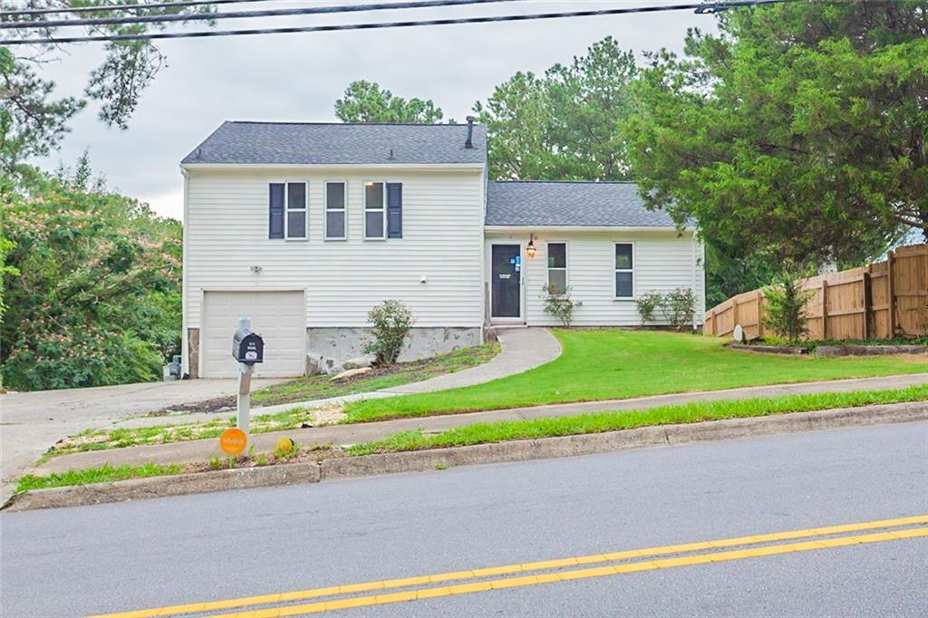 a house view with a outdoor space