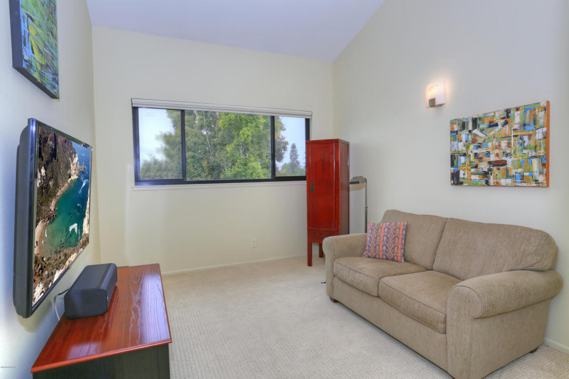 3881 Nathan Road Santa Barbara, CA 93110 - Photo 11 of 12 a living room with furniture and a flat screen tv