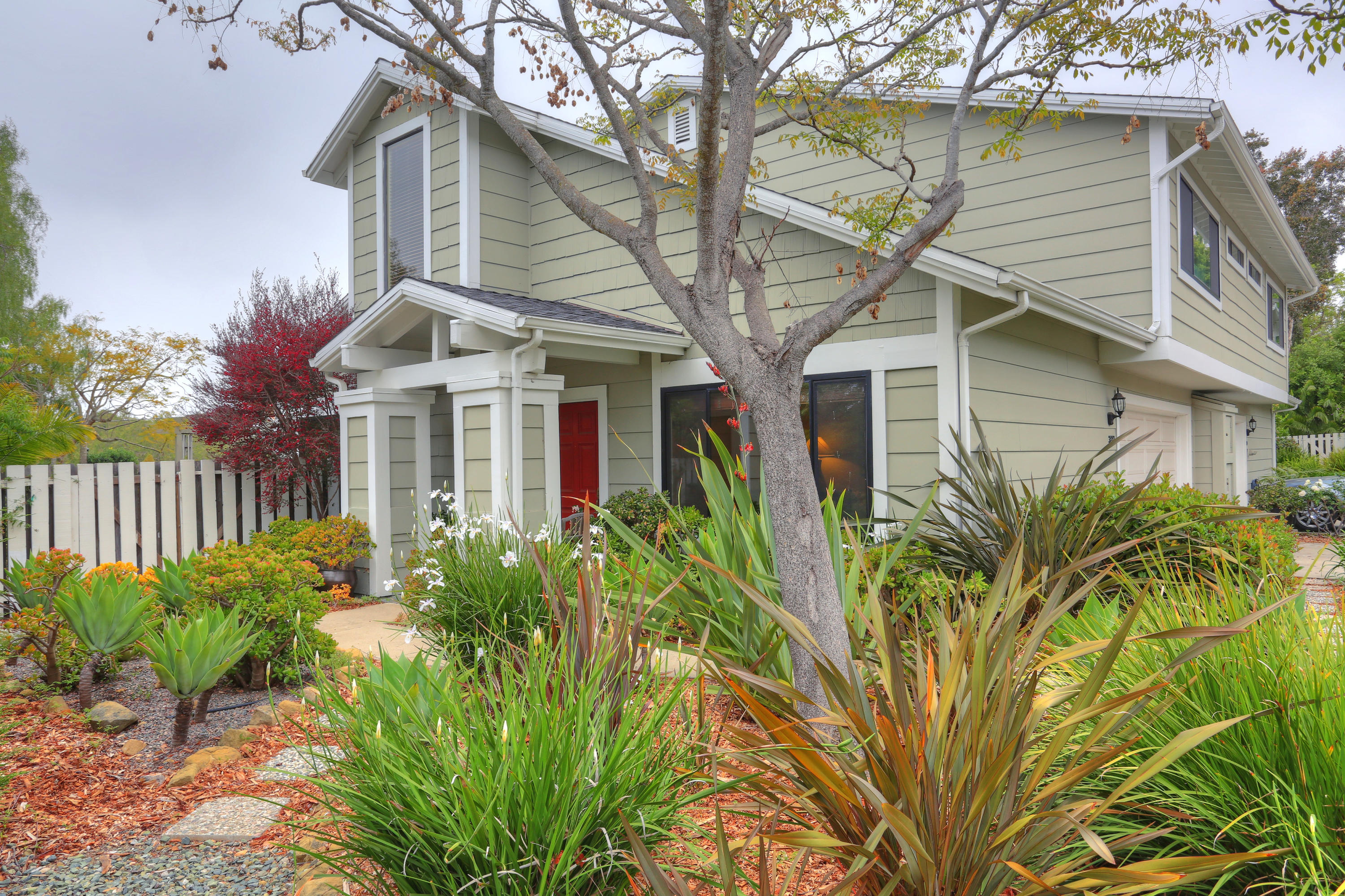 3881 Nathan Road Santa Barbara, CA 93110 - Photo 2 of 12 a front view of a house with a garden