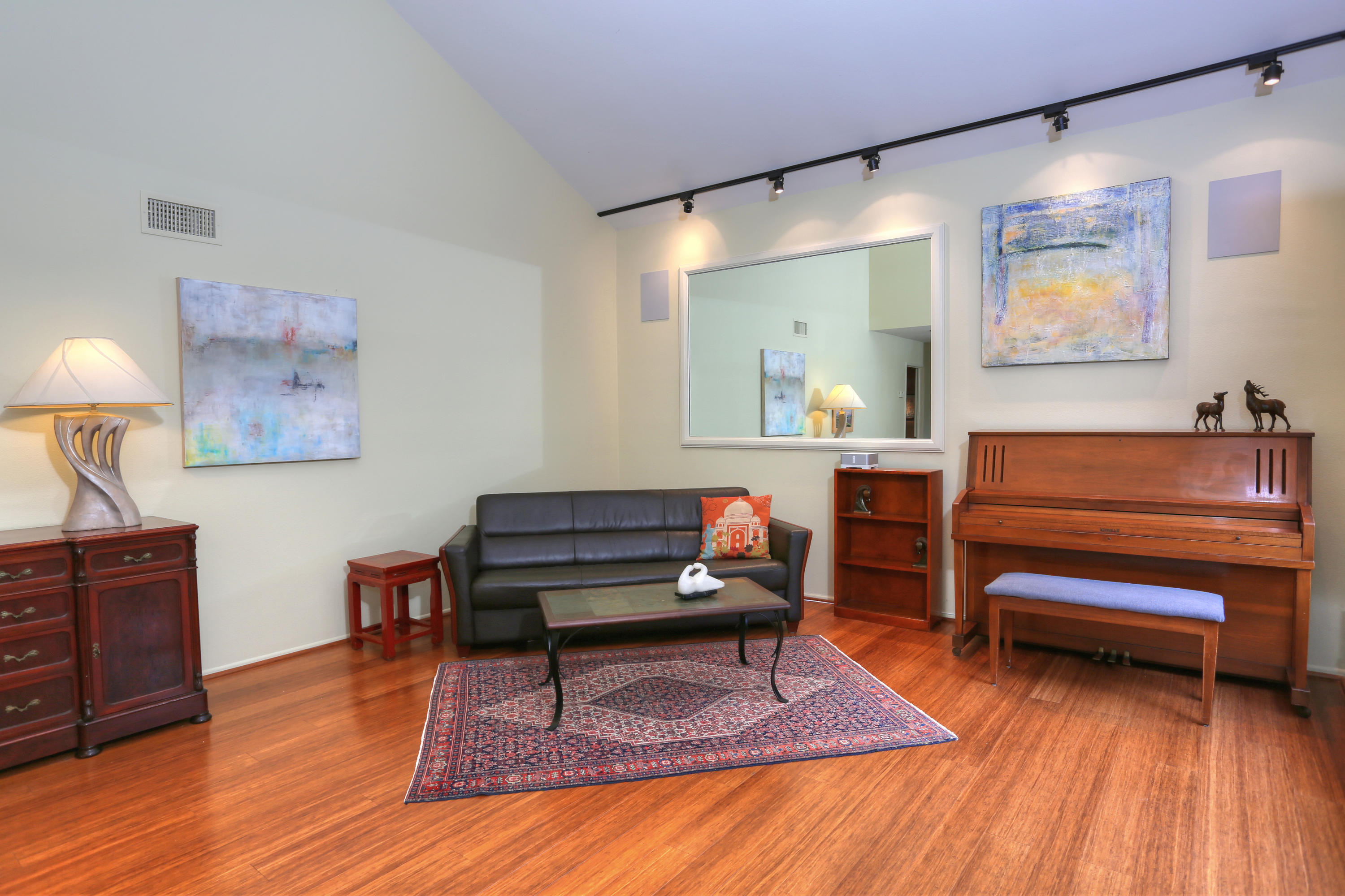 3881 Nathan Road Santa Barbara, CA 93110 - Photo 5 of 12 a living room with furniture and a wooden floor