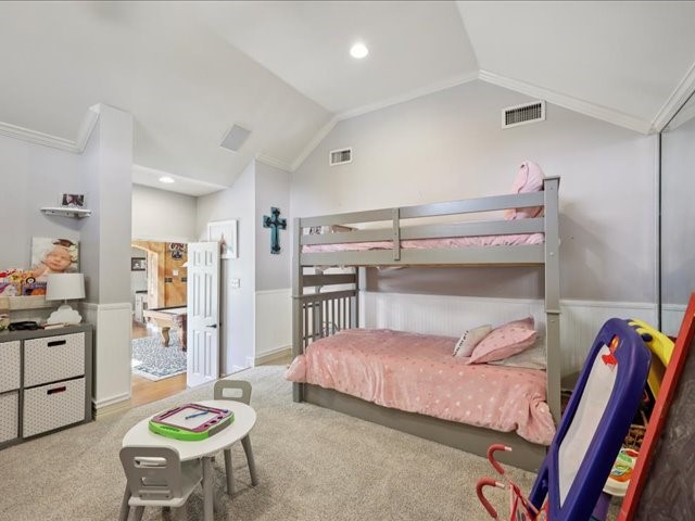 2700 Spurlock Road Nederland, TX 77627 - Photo 14 of 44 a bedroom with a bed and a chair