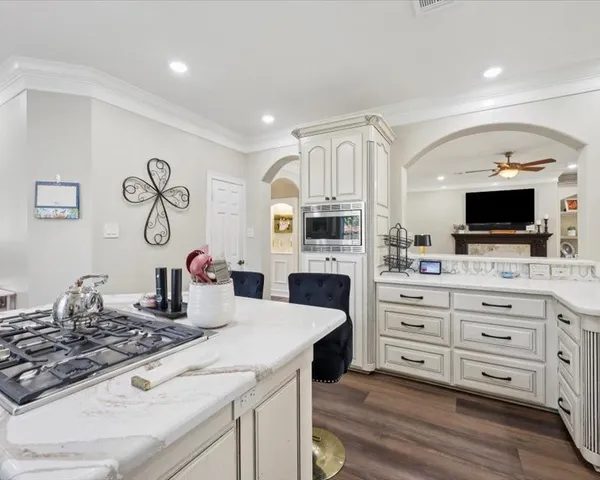 a kitchen with a stove and a sink