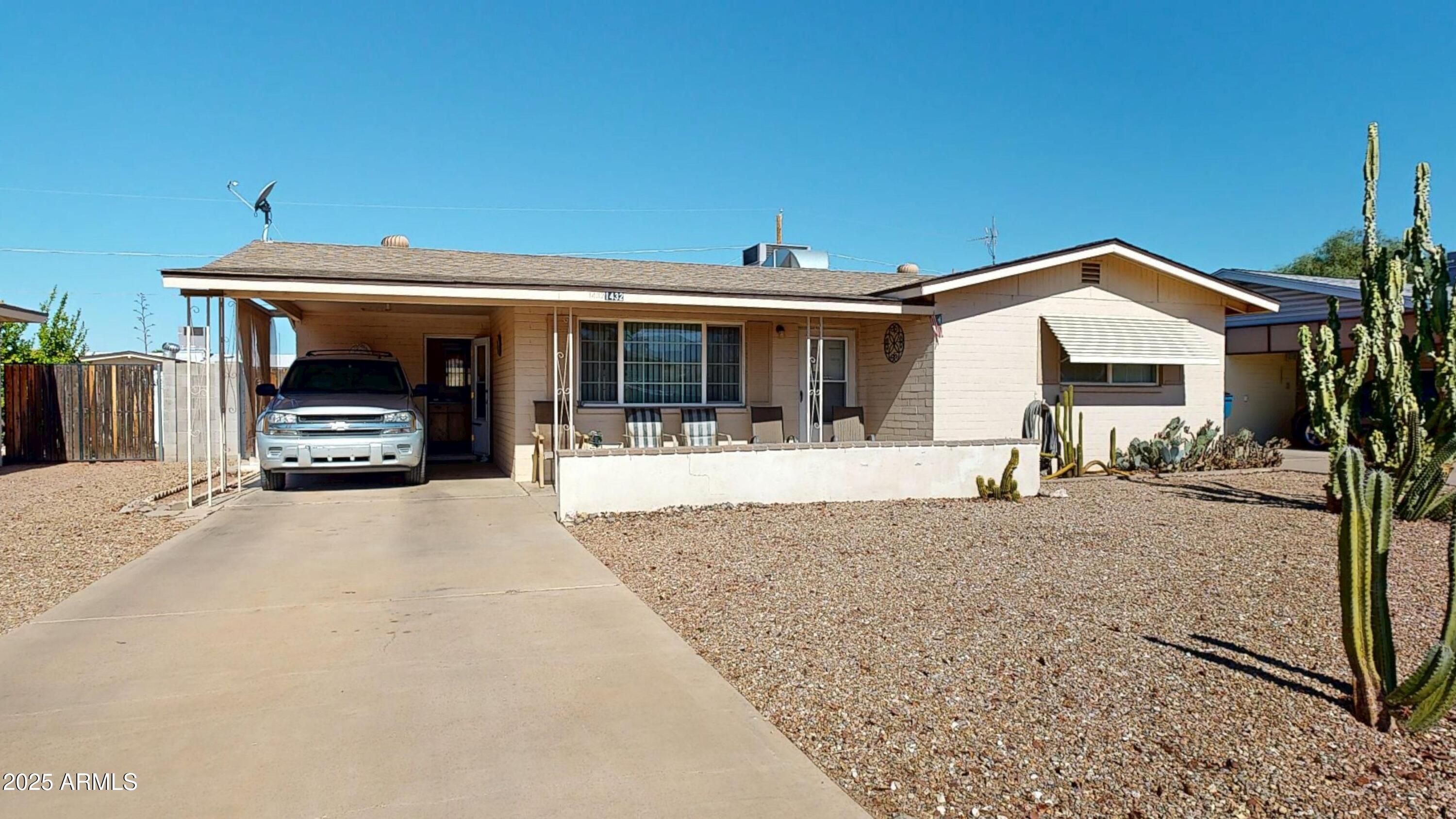 1432 South Lawther Drive Apache Junction, AZ 85120 - Photo 1 of 29 a view of a living room and livingroom with furniture
