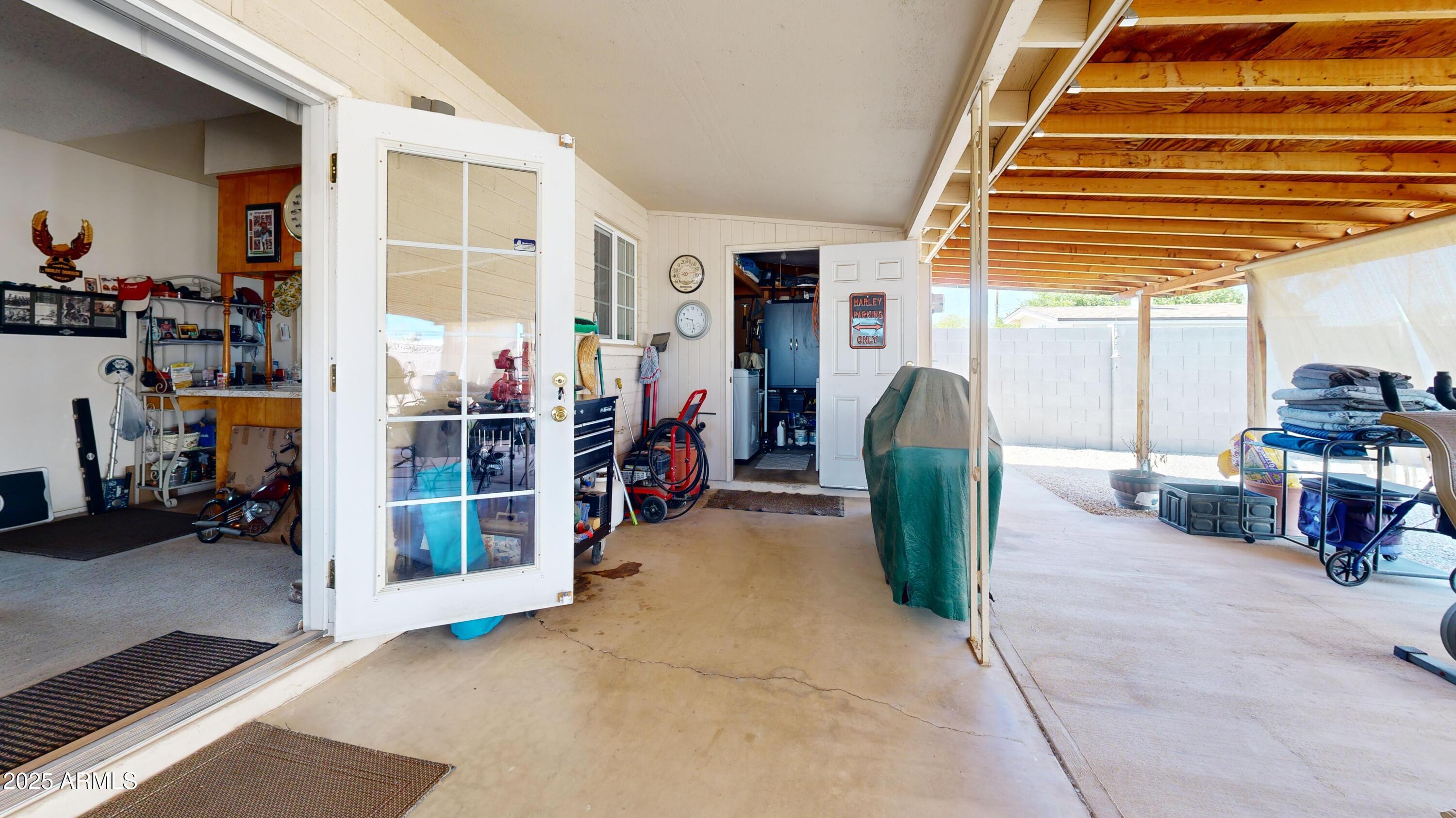 1432 South Lawther Drive Apache Junction, AZ 85120 - Photo 16 of 29 a view of a livingroom with furniture and a window