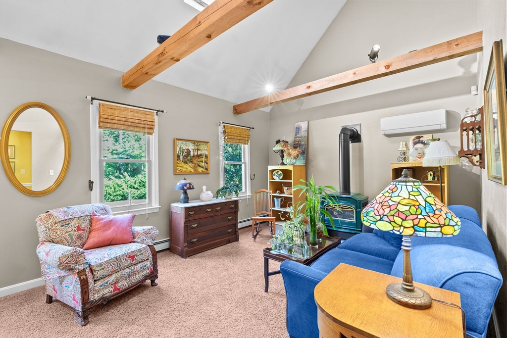 150 Ryder Road Rochester, MA 02770 - Photo 17 of 42 a living room with furniture flowerpot and a window