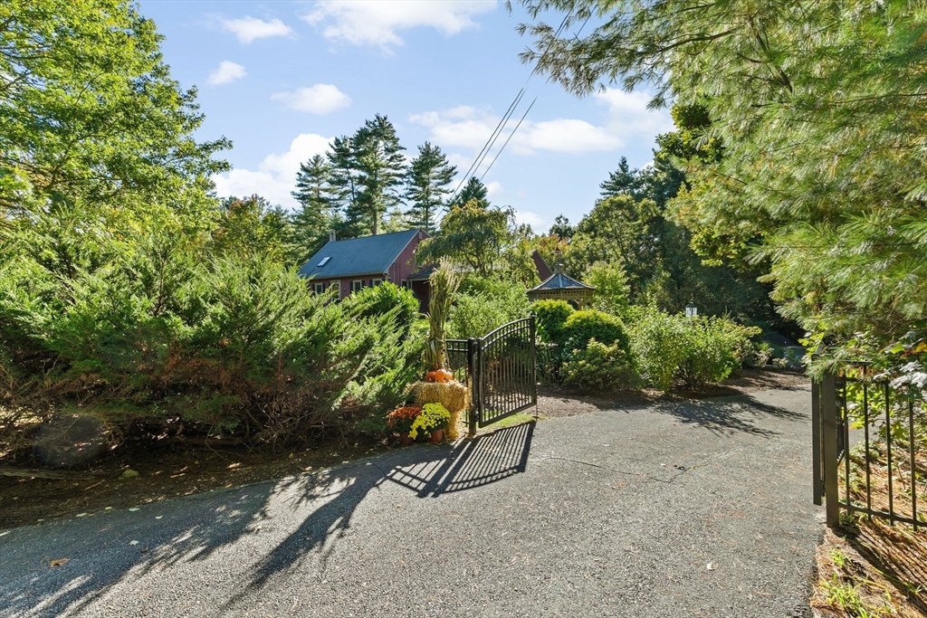 150 Ryder Road Rochester, MA 02770 - Photo 42 of 42 a view of a bench in a backyard