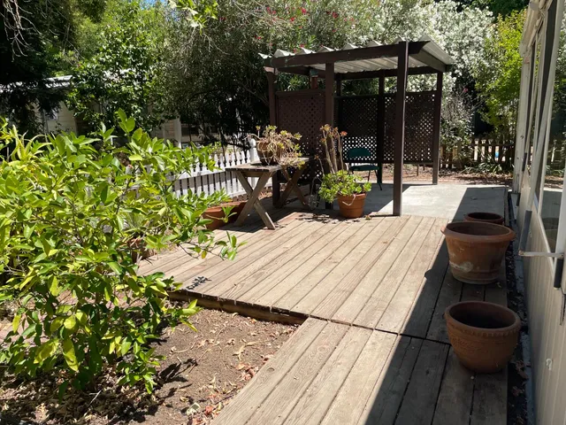 a view of a table and chairs in patio