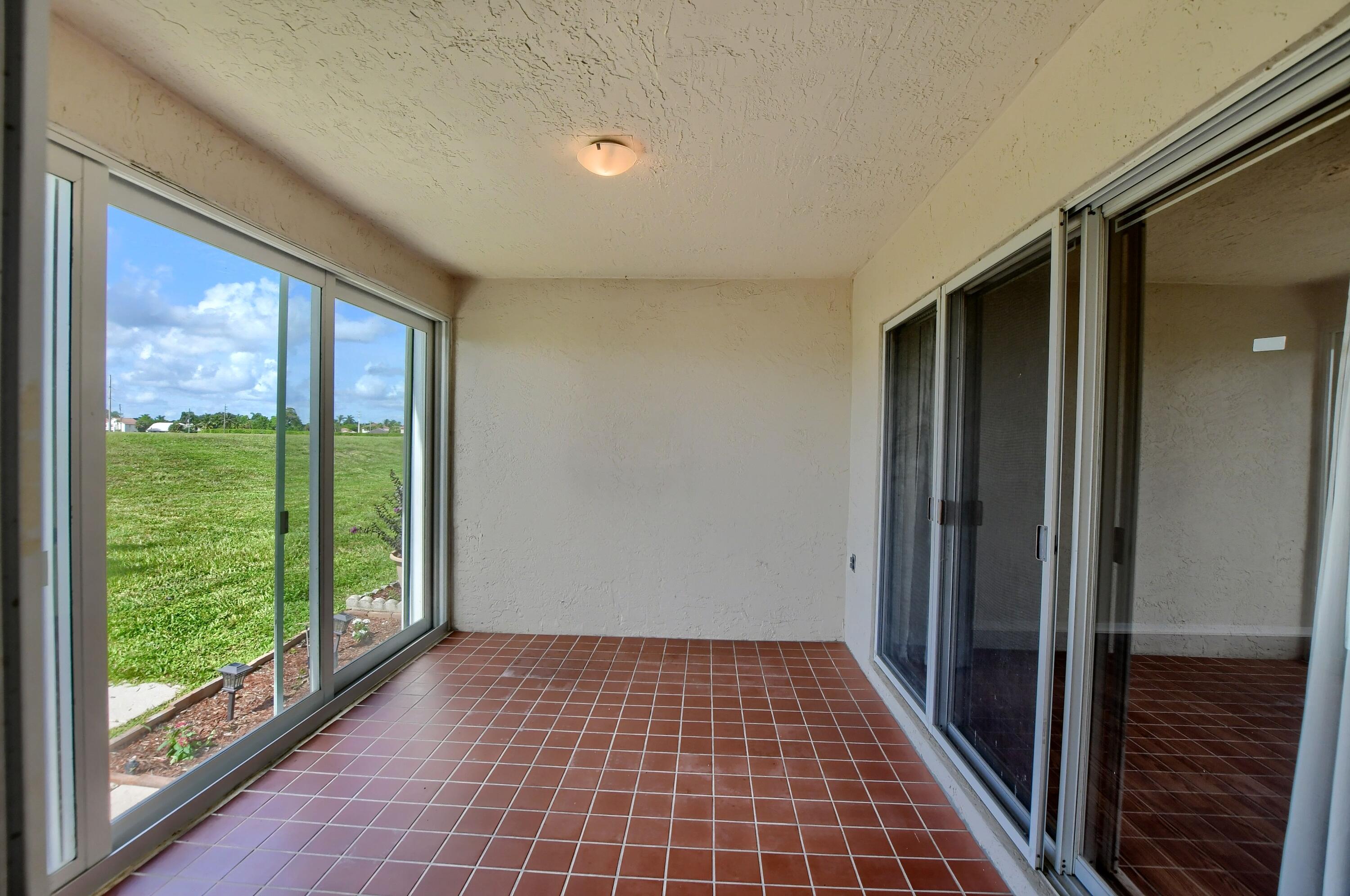 10936 Lakemore Lane Boca Raton, FL 33498 - Photo 29 of 54 Covered Patio