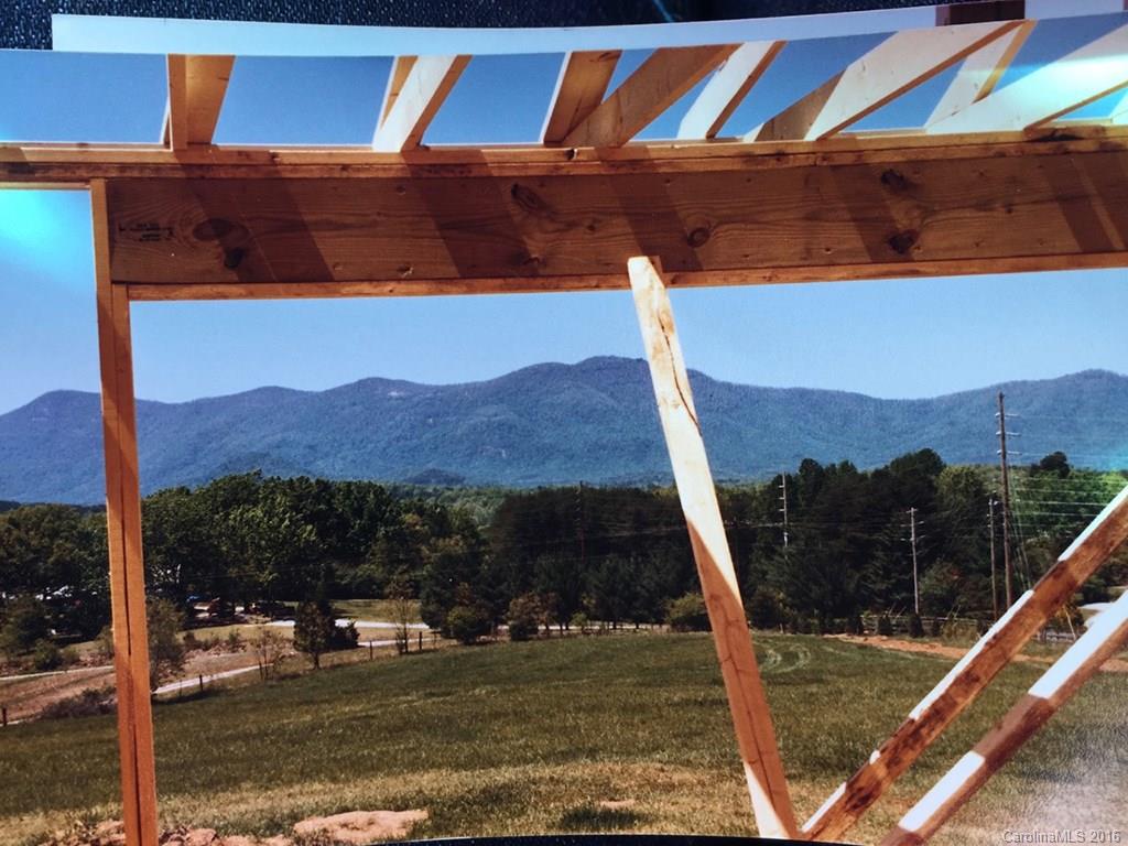 156 Luther Durham Road Tryon, NC 28782 - Photo 4 of 23 a view of a balcony with lake view and mountain view
