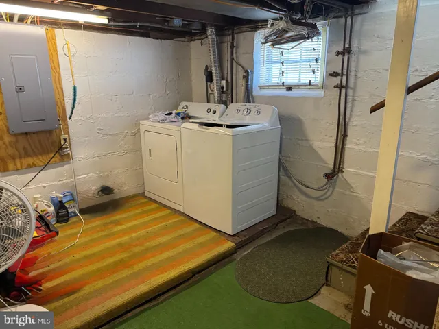 a bed room with a bed and a window