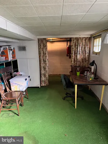 a front view of a house with parking space