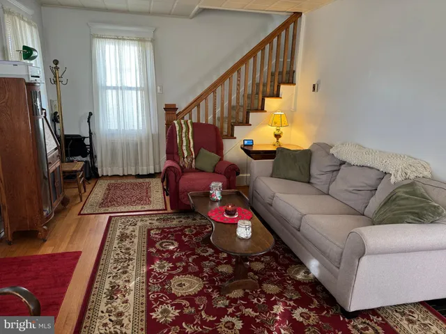 a living room with furniture or couch and a window