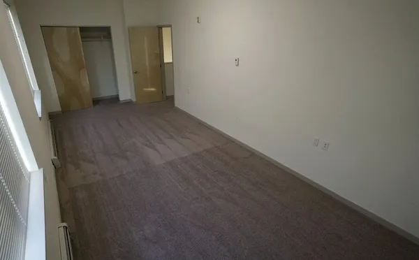 a view of hallway with closet