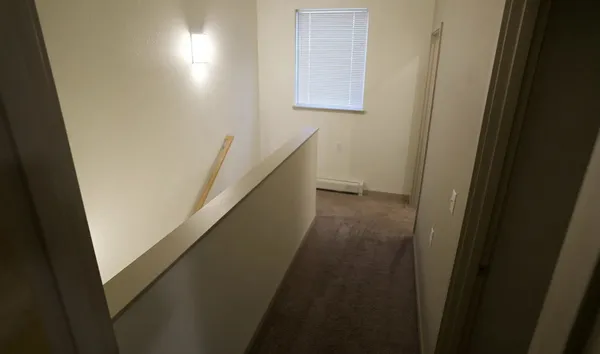 a view of hallway with stairs