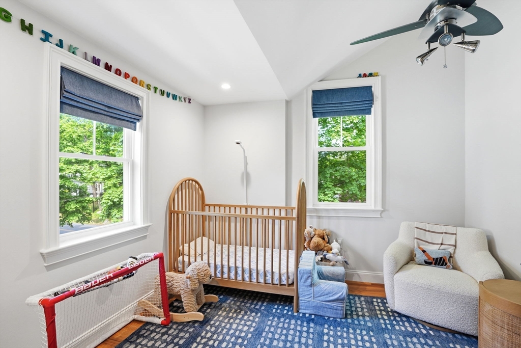59 Elm Street Hingham, MA 02043 - Photo 22 of 33 a bedroom with furniture and a window