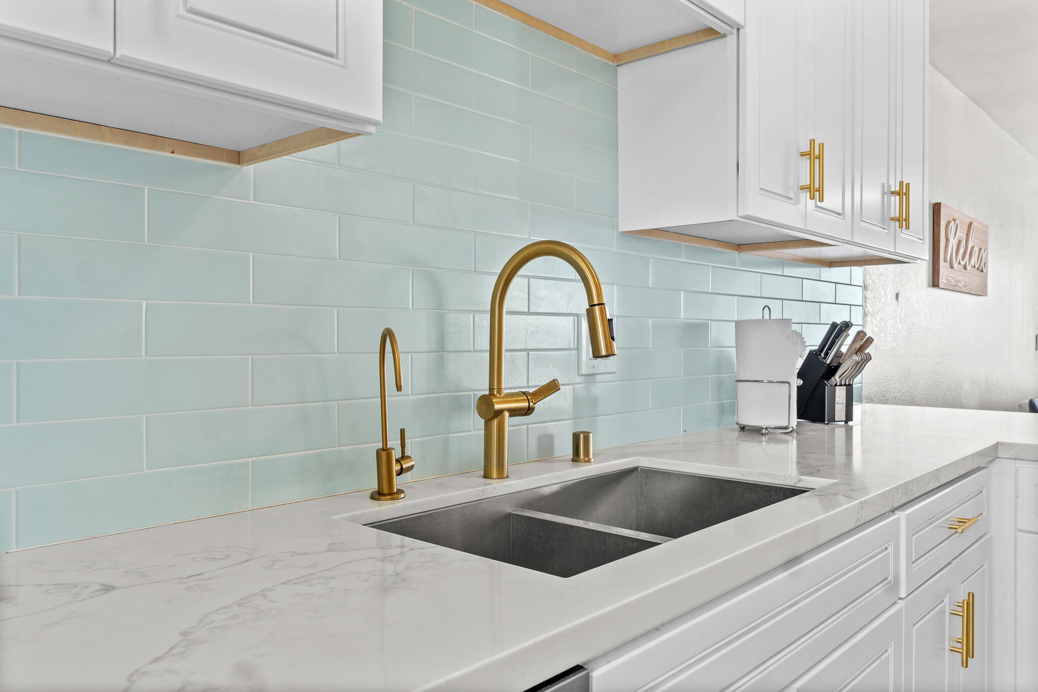 77 North Ocean Avenue, Unit 12 Cayucos, CA 93430 - Photo 7 of 41 a kitchen with a sink and a refrigerator