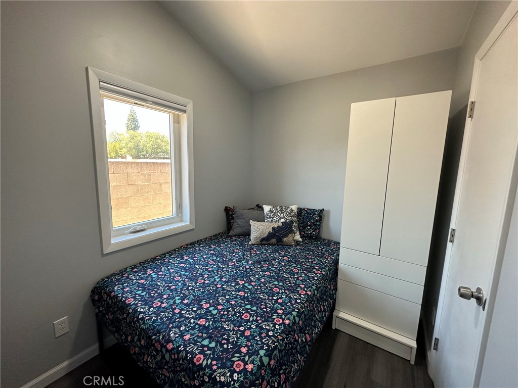 626 Broadway Gilroy, CA 95020 - Photo 2 of 5 a large bed sitting in a bedroom next to a window