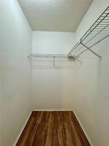 a view of a room with racks on the wall