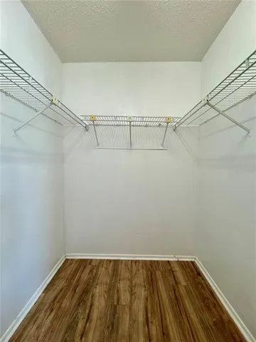 a view of a room with racks on the wall