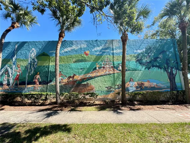 a view of a backyard of a house