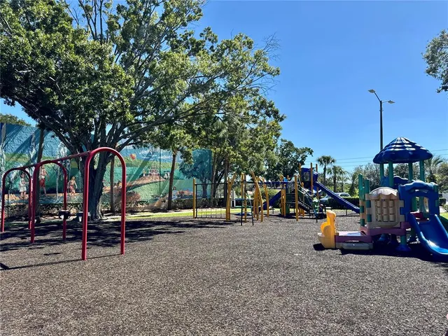 a view of swimming pool with a yard