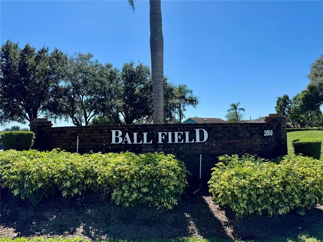 a sign on the side of the road