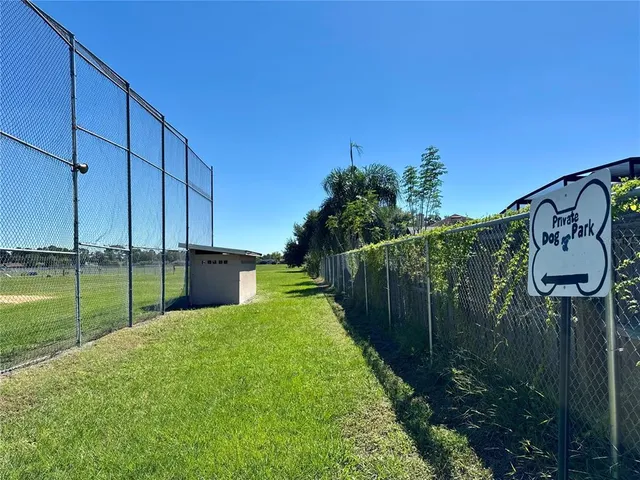 a view of a backyard with a sitting area and slide