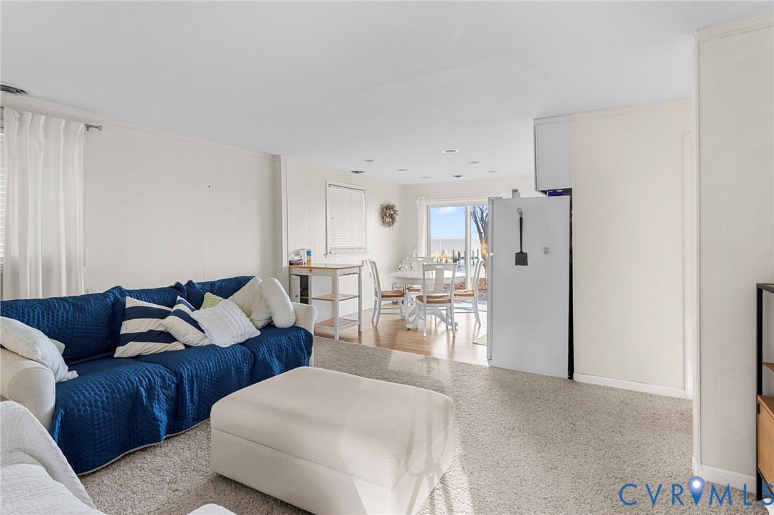 63 Bayview Lane Hague, VA 22469 - Photo 12 of 23 a living room with furniture and a couch