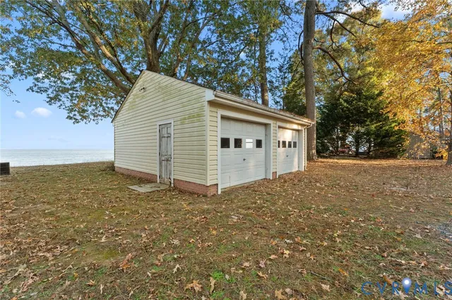 a view of a backyard of the house