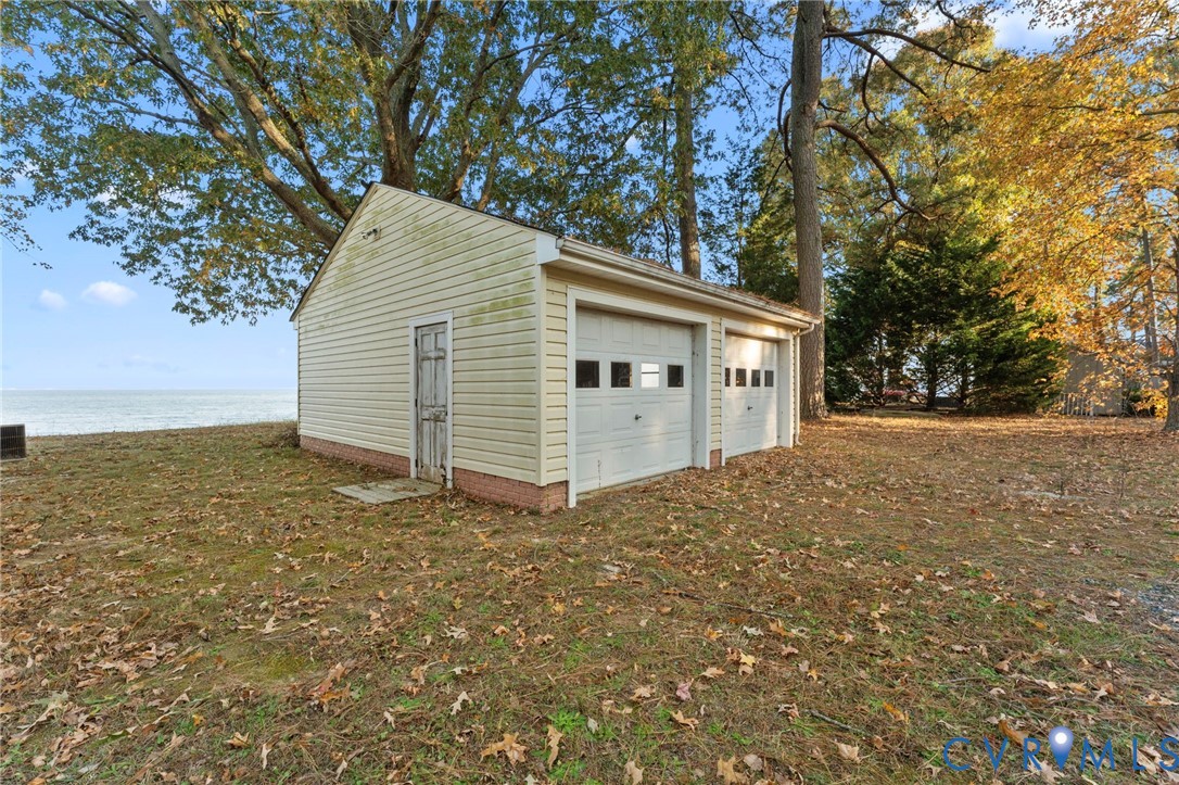 63 Bayview Lane Hague, VA 22469 - Photo 9 of 23 a view of a backyard of the house