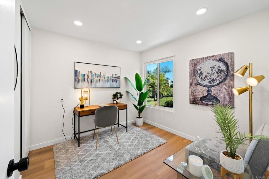 5055 Andrew Jackson Street Oceanside, CA 92057 - Photo 21 of 43 a living room with furniture and a potted plant