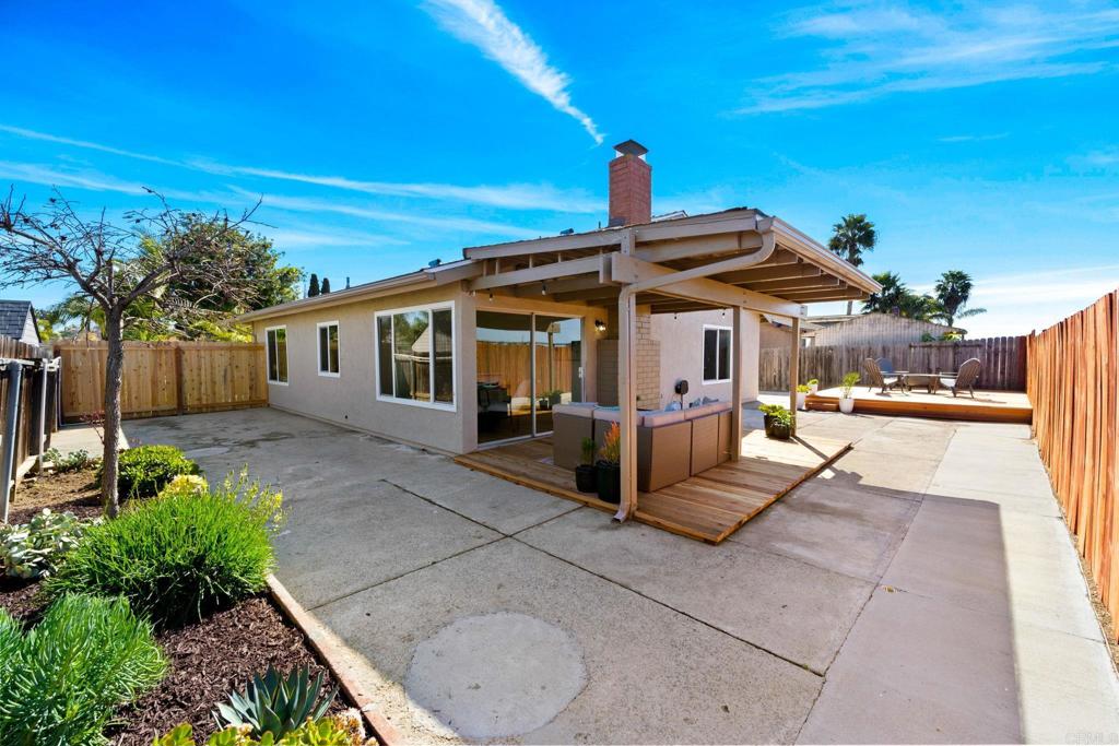 5055 Andrew Jackson Street Oceanside, CA 92057 - Photo 31 of 43 a view of a house with backyard and sitting area