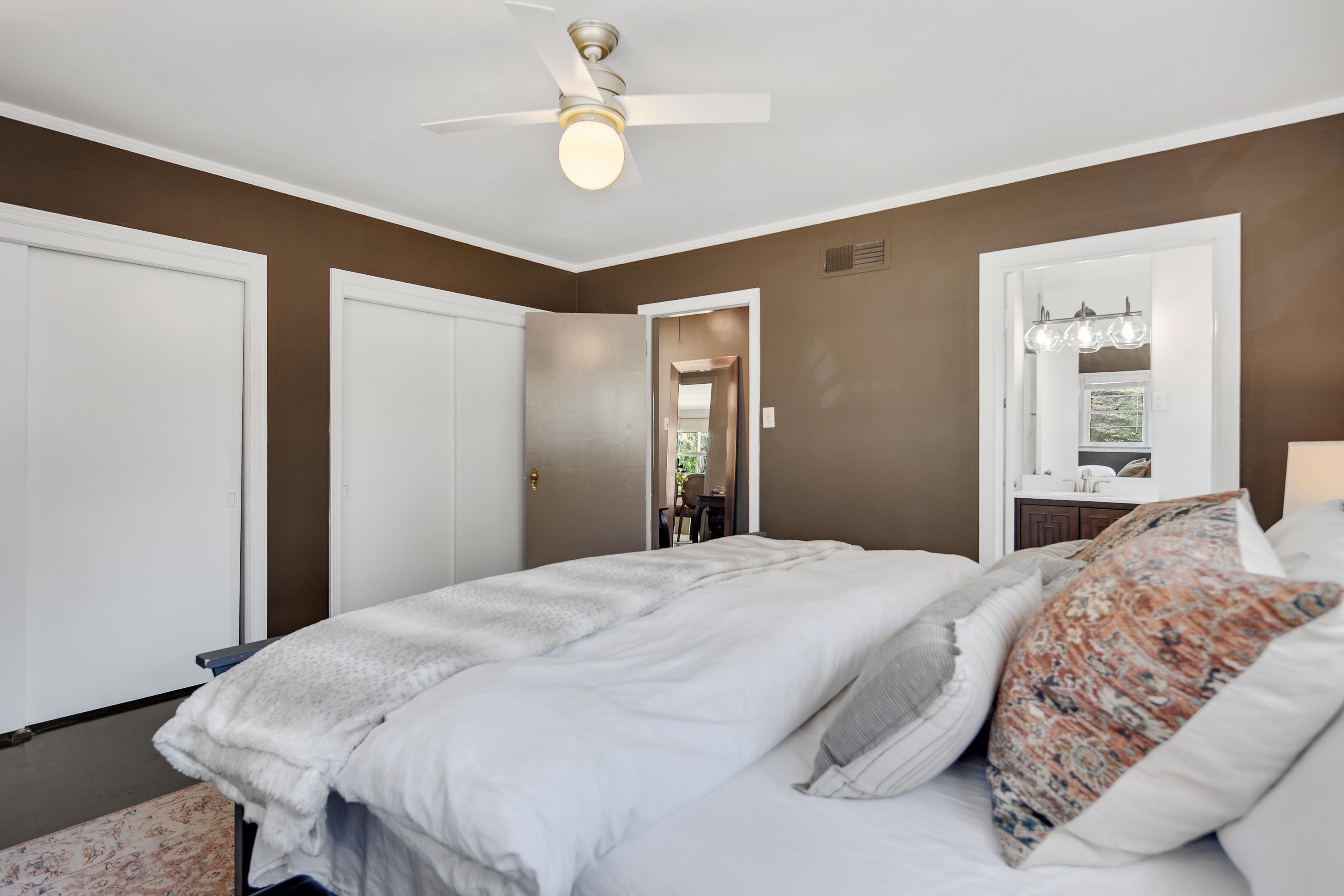 4063 Minden Road Memphis, TN 38117 - Photo 20 of 35 a spacious bedroom with a bed and a dresser