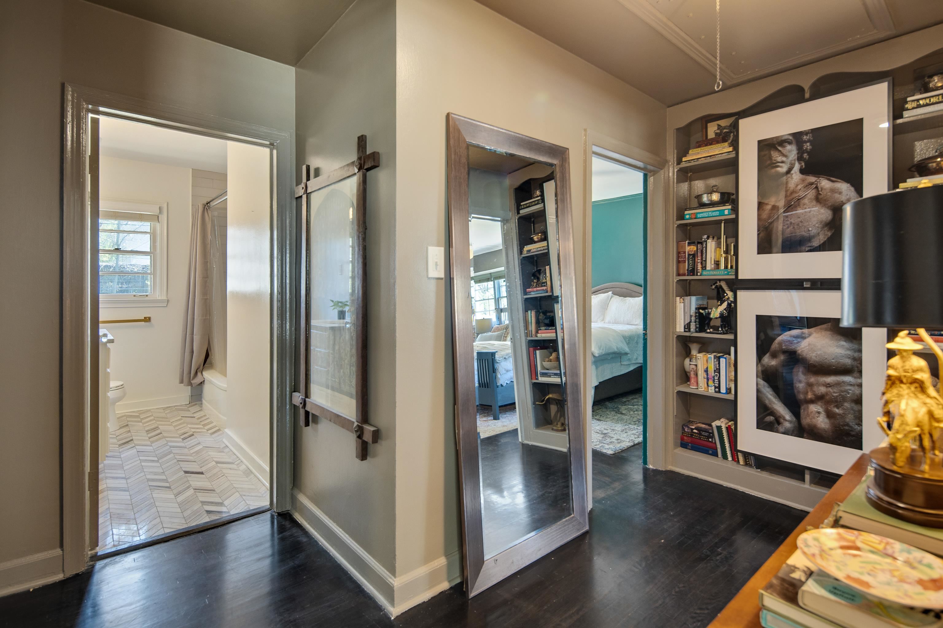 4063 Minden Road Memphis, TN 38117 - Photo 25 of 35 a view of a hallway with wooden floor and bedroom with furniture