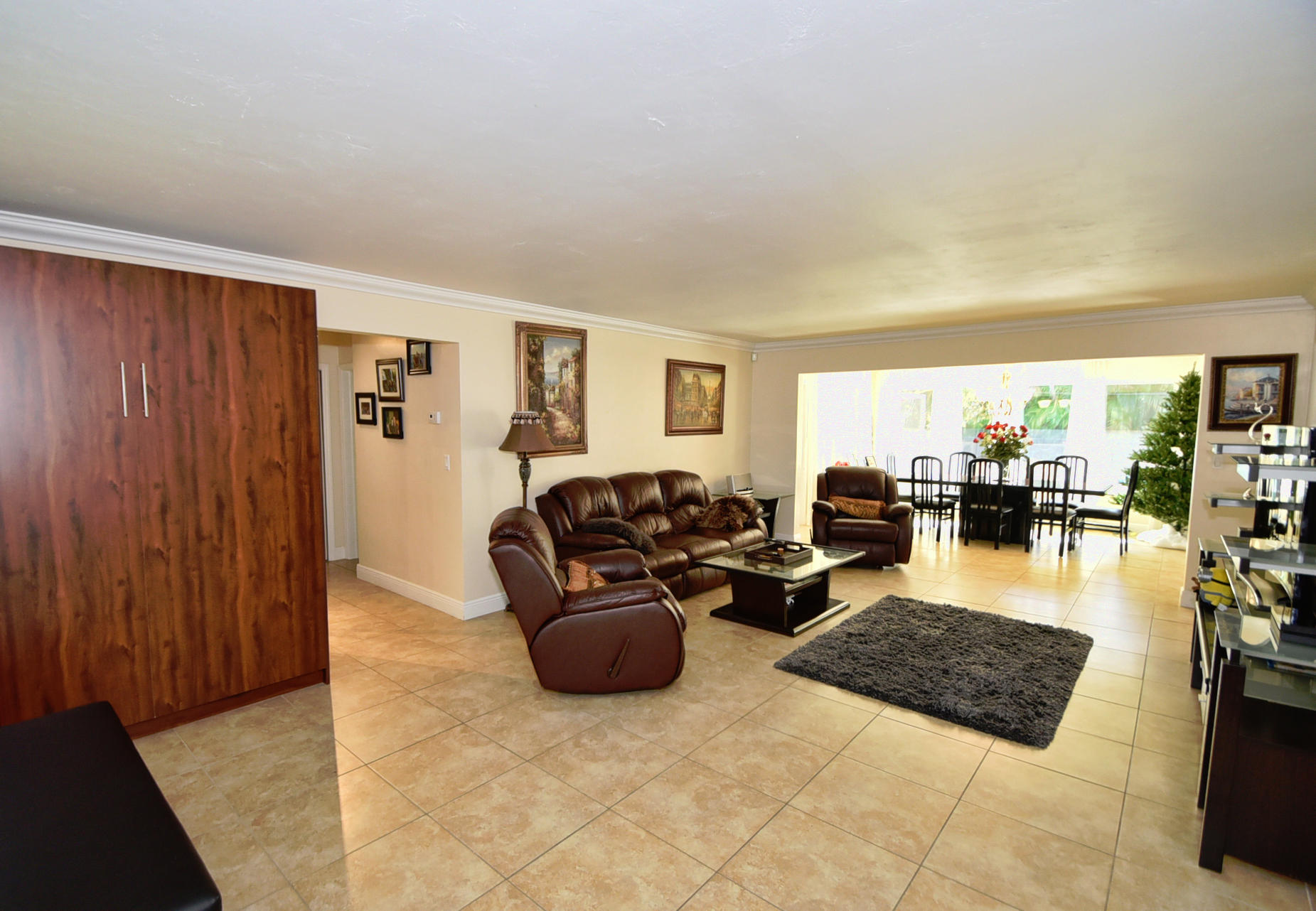 400 Northeast 2nd Street Boca Raton, FL 33432 - Photo 9 of 40 a living room with furniture window and wooden floor