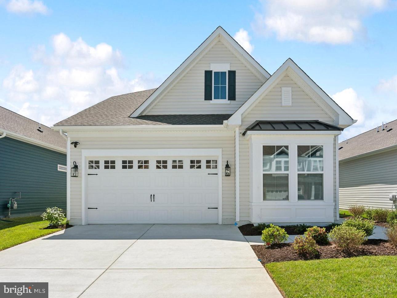a view of a house with garage