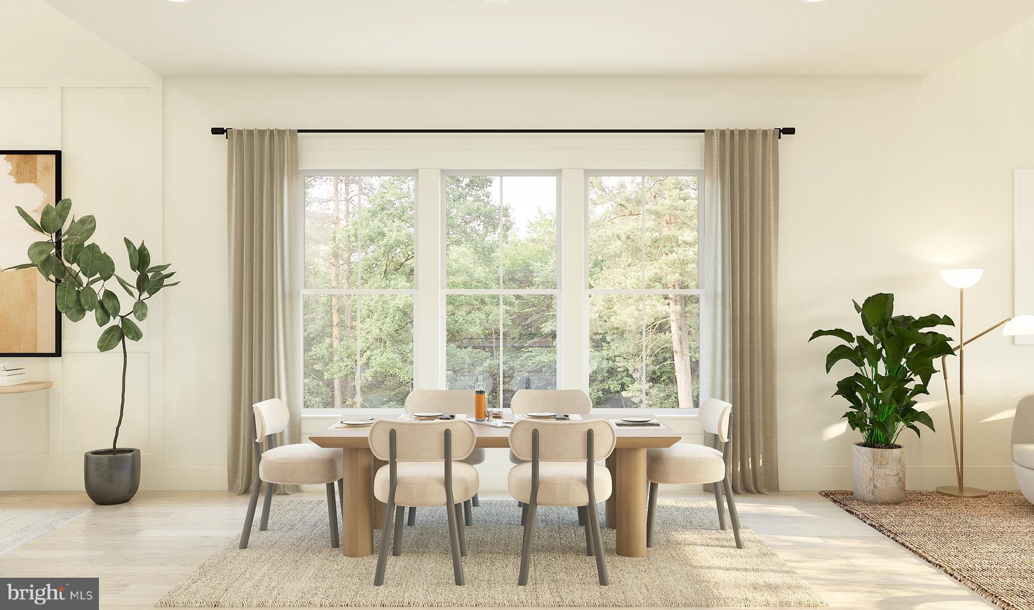 719 Warbler Way Chester, MD 21619 - Photo 2 of 38 a dining room with furniture and windows