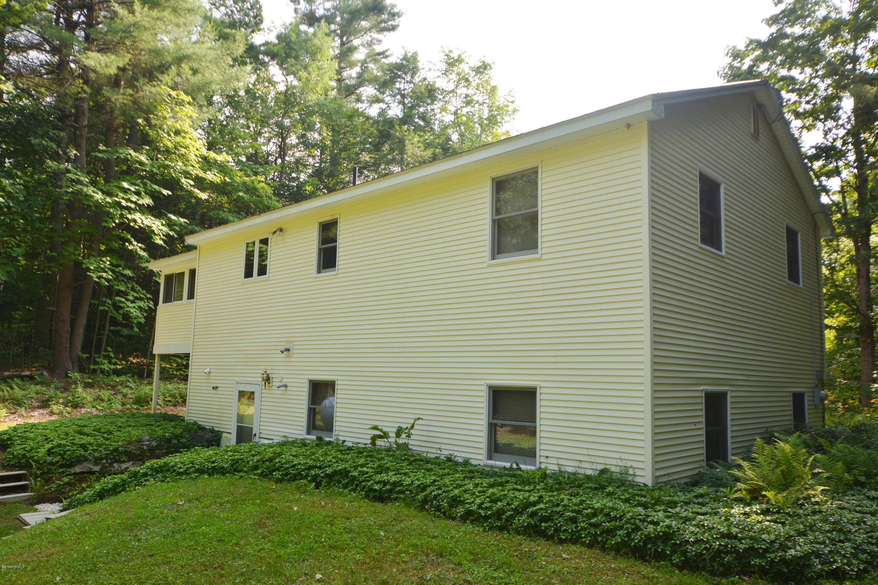 189 Tolland Road Otis, MA 01029 - Photo 2 of 16 a view of a back yard of the house