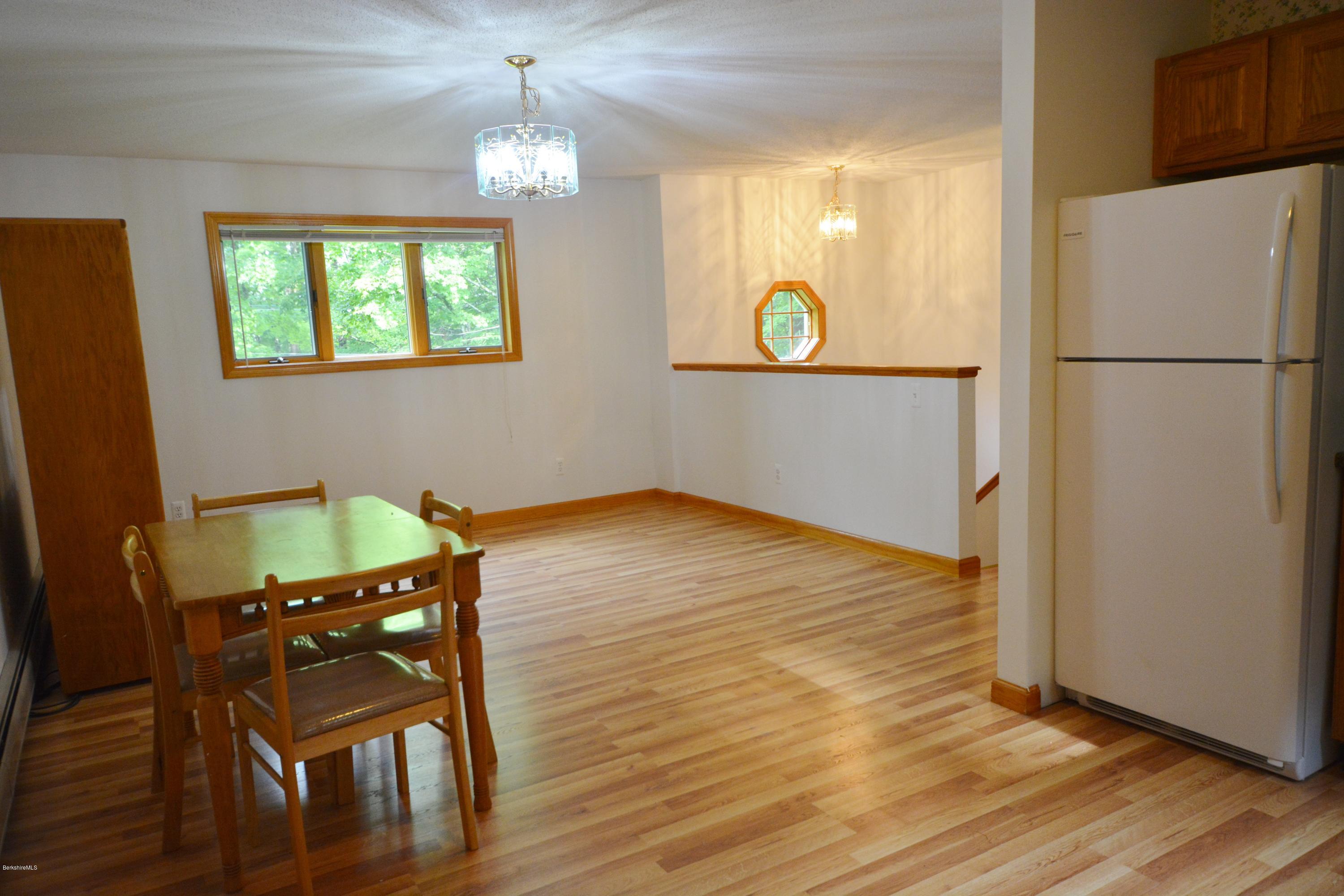 189 Tolland Road Otis, MA 01029 - Photo 4 of 16 a room with furniture and a window