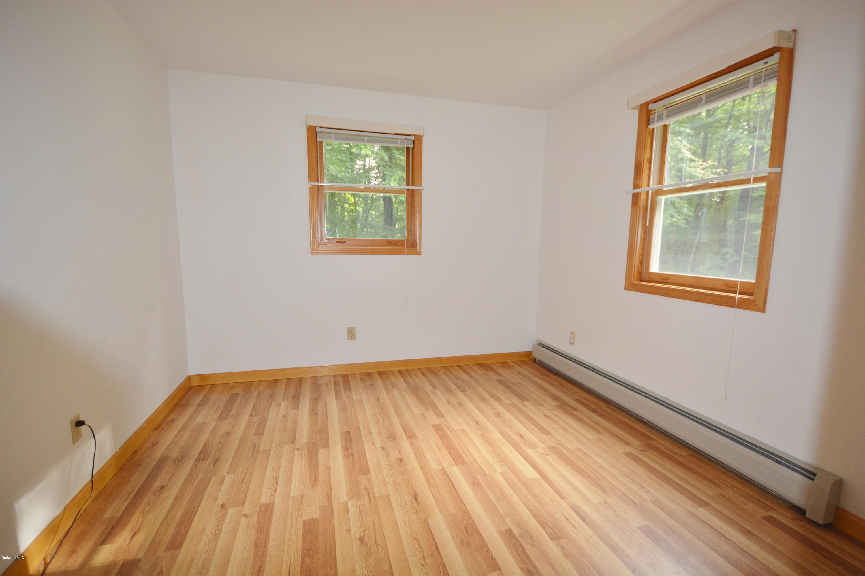 189 Tolland Road Otis, MA 01029 - Photo 5 of 16 an empty room with window